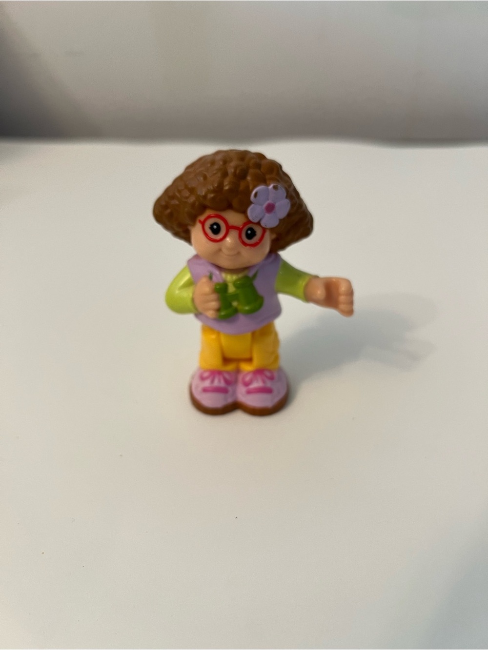Fisher-Price Brown-Haired Figurine with Red Glasses and Pink Shoes